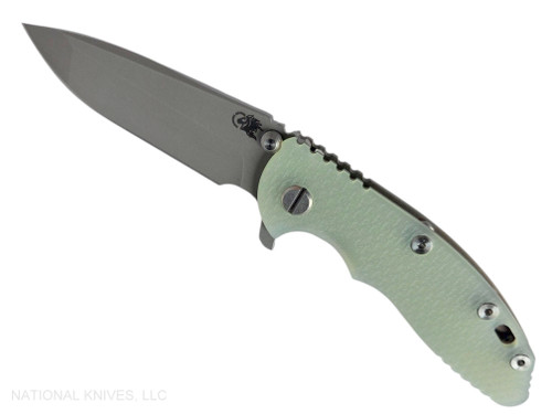 Rick Hinderer Knives XM-18 3.25" Spanto folding knife with thumb stud and flipper tab - shown open presentation side.  Working Finish MagnaCut stainless steel plain edge blade.  Translucent Green G-10 handle with Battle Bronze lock side.  Model KXM325SPA.