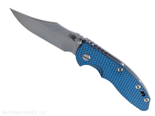 Rick Hinderer Knives Non Flipper XM-18 3.5" Bowie folding knife with thumb stud - shown open presentation side.  Stonewashed MagnaCut stainless steel plain edge blade.  Blue - Black G-10 handle with Bead Blast lock side.  Model KXM35NFBO.