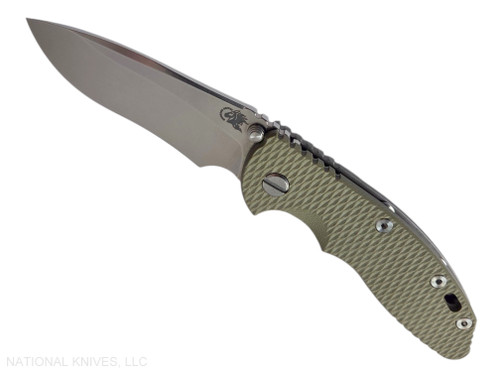 Rick Hinderer Knives Non Flipper XM-18 3.5" Recurve folding knife with thumb stud - shown open presentation side.  Stonewashed MagnaCut stainless steel plain edge blade.  OD green G-10 handle with Working Finish lock side.  Model KXM35NFREC.