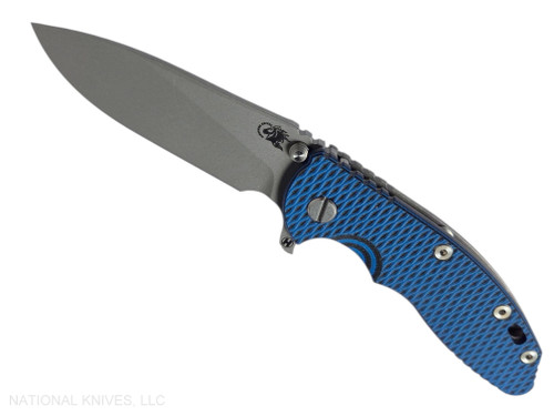 Rick Hinderer Knives XM-18 3.5" Slicer Hollow Grind folding knife with thumb stud and flipper tab - shown open presentation side.  Working Finish MagnaCut stainless steel plain edge blade.  Blue - black G-10 handle with Working Finish lock side.  Model KXM35SLHO.