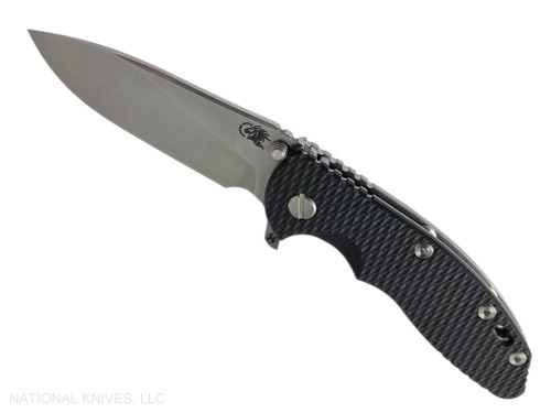 Rick Hinderer Knives XM-18 3.5" Slicer Hollow Grind folding knife with thumb stud and flipper tab - shown open presentation side.  Stonewash MagnaCut stainless steel plain edge blade.  Black G-10 handle with stonewash lock side.  Model KXM35SLHO.