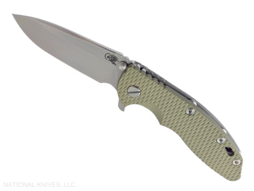 Rick Hinderer Knives XM-18 3.5" Spear Point folding knife with thumb stud and flipper tab - shown open presentation side.  Stonewash MagnaCut stainless steel plain edge blade.  OD green G-10 handle with Working Finish lock side.  Model KXM35SPE.
