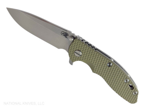 Rick Hinderer Knives XM-18 3.5" Spear Point folding knife with thumb stud and flipper tab - shown open presentation side.  Stonewash MagnaCut stainless steel plain edge blade.  OD green G-10 handle with stonewash lock side.  Model KXM35SPE.