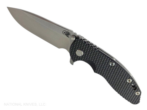 Rick Hinderer Knives XM-18 3.5" Spear Point folding knife with thumb stud and flipper tab - shown open presentation side.  Stonewash MagnaCut stainless steel plain edge blade.  Black G-10 handle with stonewash lock side.  Model KXM35SPE.