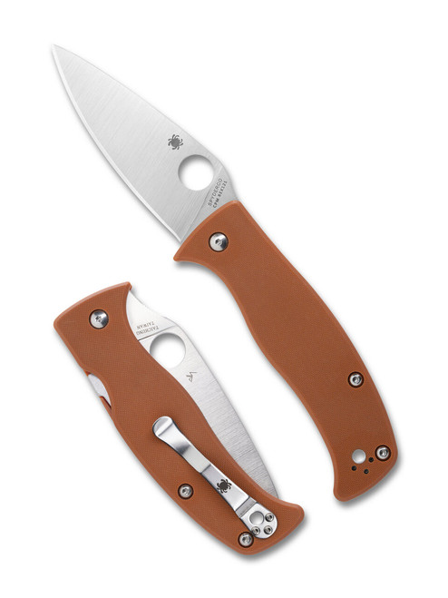 Spyderco Caribbean folding knife with thumb hole - shown open presentation side and closed pocket clip side.  Satin CPM REX 121 steel plain edge blade.  Orange G-10 handle.  Model C217GPBOR.