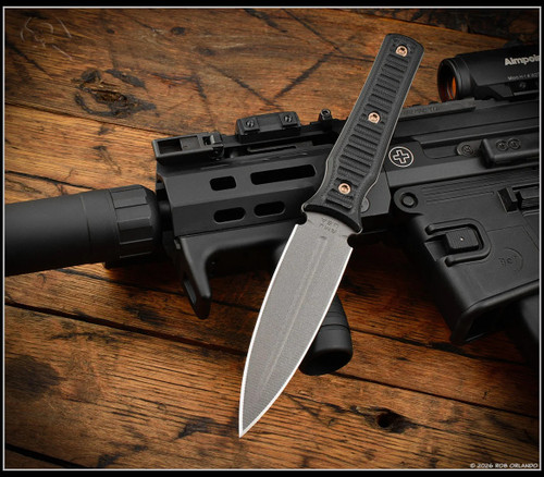 RMJ Tactical Orlando Special fixed blade knife - shown out of sheath reverse with sheath aside it.  Tungsten Cerakote CPM-3V stainless steel plain double edge blade.  Black G-10 handle.  Model K-OS-3V-TU-BK.
