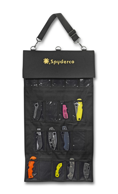 Spyderco Spyderpac Small knife storage and carry case - shown open with display knives inserted into pockets.  Black nylon construction.  Model SP2.