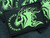 Rick Hinderer Knives Horse Head Logo Morale Patch - obverse.  Black and neon green with hook and loop backing.  Model A00100BG00.
For reference only.
