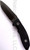 Rick Hinderer Knives FXM Spanto fixed blade knife - shown out of sheath reverse.  Black DLC S35VN stainless steel plain edge blade.  Black G-10 handle.  Model K60120NBSP.