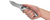 Zero Tolerance 0920 folding knife with flipper tab - shown open in hand.  20CV stainless steel plain edge blade.  Titanium handle.  Model 0920.
For reference only.