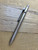 Tactile Turn Side Click ink pen.  Button side shown.  Overall length is 4.6" and features titanium construction.  Model 10-SC3-TTM-TTM.
