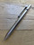 Tactile Turn Side Click ink pen.  Button side shown.  Overall length is 4.6" and features titanium construction.  Model 10-SC3-TTM-TTM.