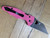 Blemished Spyderco Yojimbo 2 Sprint Run folding knife with thumb hole - shown open pocket clip side.  Black CPM-S30V stainless steel plain edge blade.  Pink G-10 handle.  Model C85GPNBKP2.