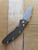 USED Rick Hinderer Knives XM-18 Automatic Bowie knife with push button - shown open presentation side.  Working Finish S45VN stainless steel plain edge blade.  Battle Bronze titanium handle. 
