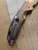 USED Rick Hinderer Knives XM-18 Automatic Spearpoint knife with push button - close up of pocket clip side handle shown.  Stonewash 20CV stainless steel plain edge blade.  Anodized bronze titanium handle. 