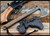RMJ Tactical Kestrel Trail tomahawk - shown out of sheath obverse.  Tungsten Cerakote 80CRV2 steel plain edge head.  Hyena Brown iG-10 handle.
For reference only.