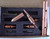 Rick Hinderer Knives Modular Kubaton Deluxe Pen Set - shown in case.  Copper construction.  Model P5804006DL.
