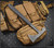 RMJ Tactical L13 Loggerhead tomahawk - shown out of sheath obverse.  Tungsten Cerakote 80CRV2 plain edge head.  Black rubber handle.  Model T-L13-TU-BK.