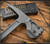 RMJ Tactical Snuggles 18" tactical hammer - shown close up of head obverse.  Tungsten Cerakote 80CRV2 steel head.  Dirty Olive G-10 handle.