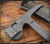 RMJ Tactical Snuggles 18" tactical hammer - shown close up of head reverse.  Tungsten Cerakote 80CRV2 steel head.  Hyena Brown G-10 handle.