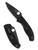 Spyderco Tenacious folding knife with thumb hole - shown open presentation side and closed pocket clip side.  Black 8Cr13MoV stainless steel serrated edge blade.  Black FRN handle.  Model C122SBBK.
