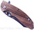 Rick Hinderer Knives Vintage Series XM-18 3.5" Skinner folding knife with thumb stud and flipper tab - shown closed presentation side.  Black O-1 steel plain edge blade.  Smooth Walnut handle with Battle Green titanium lock side.  Model K2042S0VT00.
For reference only.