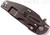 Rick Hinderer Knives Jurassic Slicer folding knife with thumb stud and flipper tab - shown closed lock side.  Battle Black 20CV stainless steel plain edge blade.  Blue - black G-10 handle with Battle Black titanium lock side.  Model K201JSGDBK.
For reference only.