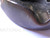 RMJ Tactical Gold Point Forge Ashtray - shown close up of obverse.  Solid steel construction featuring a Catacombs pattern.