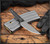 RMJ Tactical Unmei fixed blade knife - shown out of sheath obverse.  Tungsten Cerakote Nitro-V stainless steel plain edge blade.  Black G-10 handle.