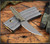 RMJ Tactical Unmei fixed blade knife - shown out of sheath obverse.  Tungsten Cerakote Nitro-V stainless steel plain edge blade.  Dirty Olive G-10 handle.