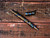 Rick Hinderer Knives Investigator ink pen - shown with cap off.  Spiral anodized "Painted" titanium construction.  Model P5801201PT.
For reference only.
