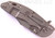 Rick Hinderer Knives XM-18 3.5" Bowie folding knife with thumb stud and flipper tab - shown closed lock side.  Working Finish 20CV stainless steel plain edge blade.  Grey G-10 handle with Working Finish titanium lock side.  Model K2032SGW00.