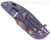 Rick Hinderer Knives XM-18 3.5" Bowie folding knife with thumb stud and flipper tab - shown closed lock side.  Stonewash 20CV stainless steel plain edge blade.  Blue G-10 handle with stonewash blue titanium lock side.  Model K2032SGS00.
