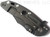 Rick Hinderer Knives XM-18 3.5" Bowie folding knife with thumb stud and flipper tab - shown closed lock side.  Battle Black 20CV stainless steel plain edge blade.  Black G-10 handle with Battle Black titanium lock side.  Model K20320SNNC.