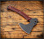 RMJ Tactical Weeserker Camp Axe - shown out of sheath obverse.  Black 80CRV2 steel plain edge head.  Black Widow G-10 handle.