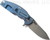 Rick Hinderer Knives Jurassic Spear Point folding knife with thumb stud and flipper tab - shown open lock side.  Working Finish 20CV stainless steel plain edge blade.  Blue G-10 handle with Battle Blue lock side.  Model K208JSGW00.
