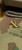 Rick Hinderer Knives Pivot Screw to fit XM-18 3.5" - shown not installed on knife.  Brass construction.  Model K215200500.