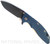 Rick Hinderer Knives XM-18 3.5" Slicer folding knife with thumb stud and flipper tab - shown open presentation side.  Battle Black 20CV stainless steel plain edge blade.  Blue - black G-10 handle with Battle Black titanium lock side.  Model K20120SPNC.