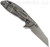 Rick Hinderer Knives XM-18 3.0" Wharncliffe folding knife with thumb stud and flipper tab - shown open lock side.  Working Finish 20CV stainless steel plain edge blade.  OD Green G-10 handle with Working Finish lock side.  Model KXM3000WC.