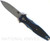 Rick Hinderer Knives Maximus Bayonet Grind folding knife - shown open presentation side.  Working Finish 20CV stainless steel plain edge blade.  Black G-10 handle with Battle Blue titanium.  Model KMAXBAY.