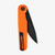 Tactile Knife Co Seasonal Release Safety First folding knife with thumb stud - shown partially open pocket clip side.  Black MagnaCut stainless steel plain edge blade.  Safety First themed titanium handle.