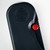 Tactile Knife Co Seasonal Release Stealth folding knife with thumb stud - shown close up of pivot.  Black MagnaCut stainless steel plain edge blade.  Stealth themed titanium handle.