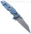 Rick Hinderer Knives Eklipse Wharncliffe folding knife with flipper tab and thumb stud - shown open lock side.  Working Finish 20CV stainless steel plain edge blade.  Blue G-10 handle with Battle Blue lock side.  Model KEK35WC.