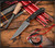 RMJ Tactical Sparrow fixed blade knife - shown out of sheath obverse.  Tungsten Cerakote MagnaCut stainless steel plain edge blade.  Black G-10 handle.  Model K-SP-MC-TU-BK.

