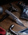 Chaves Knives Scapegoat Street folding knife with thumb stud - shown open pocket clip side.  Satin M390 stainless steel plain edge blade.  Stonewash titanium handle.  Model ST/SG/SWTI/BF.