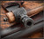 RMJ Tactical Patriot pipe tomahawk - shown close up of pipe bowl.  6150 steel plain edge head.  Ash wood handle.  Model T-PA-HK-NA.