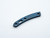 Rick Hinderer Knives Titanium Backspacer for the 3.5" XM-18 folding knife.  Battle Blue finish.