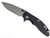 Rick Hinderer Knives XM-18 Skinny Slicer with thumb stud and flipper tab - shown open presentation side.  Working Finish Magnacut stainless steel, hollow ground, plain edge blade.   Black G-10 handle with Battle Bronze lock side. 