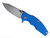 Rick Hinderer Knives Jurassic Hollow Grind Slicer folding knife with flipper tab - shown open presentation side.  Stonewash MagnaCut stainless steel plain edge blade.  Blue G-10 handle scale with stonewash titanium lock side.  Model KJURSLHO.