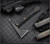 RMJ Tactical Dvalinn tomahawk - shown out of sheath reverse.  Graphite Black Cerakote Nitro-V stainless steel plain edge head.  Black G-10 handle.  Model T-DV-GB-BL.